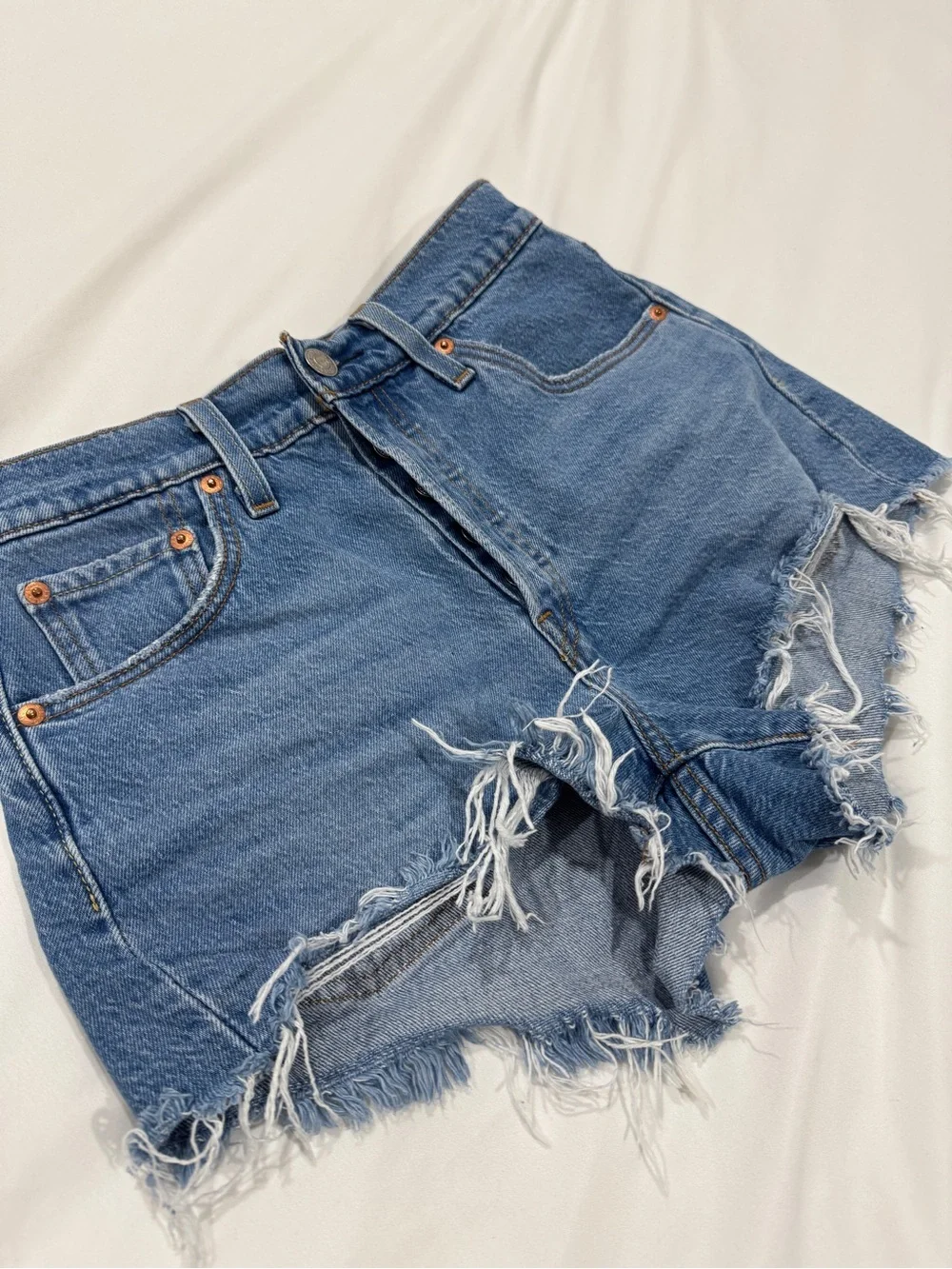 Levi's Distressed Cutoff Denim Shorts in Blue